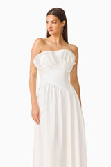 Brunette model wearing the Laurel Sleeveless Maxi Dress in Pearl White close up shot 