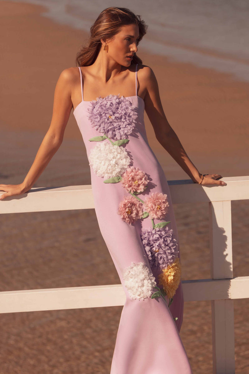 Brunette model wearing Buttercup Embroidered Maxi Dress in Purple front shot