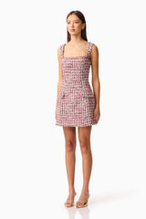 Brunette model wearing Bianca Tweed Mini Dress in Red side shot