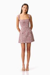 Brunette model wearing Bianca Tweed Mini Dress in Red posed shot