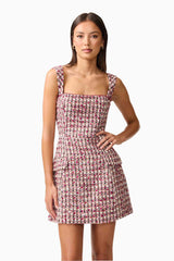 Brunette model wearing Bianca Tweed Mini Dress in Red close up hand on hip shot
