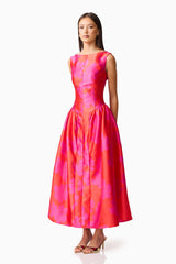 Brunette model wearing Eloise A-Line Midi Dress in Pink & Red side shot