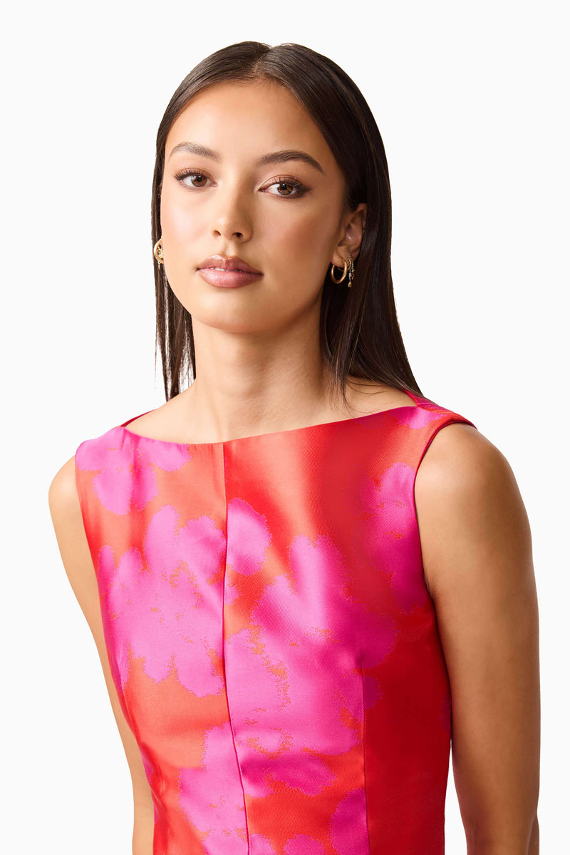 Brunette model wearing Eloise A-Line Midi Dress in Pink & Red detail shot