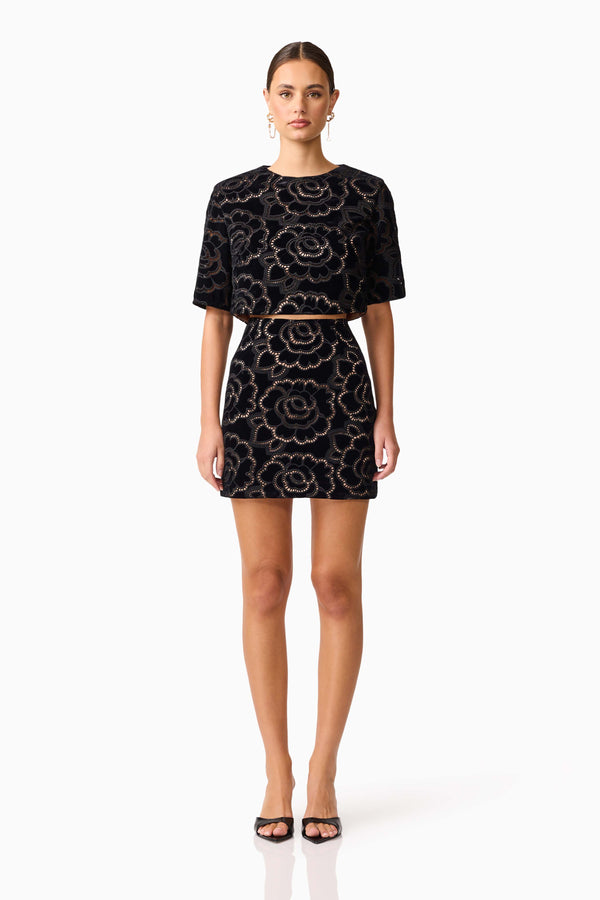 Brunette model wearing the Eris Short Sleeve Set in Black front shot 