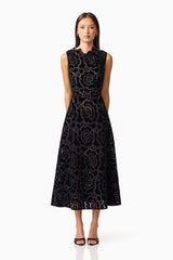 Brunette model wearing Eris Fit & Flare Midi Dress in Black front shot 
