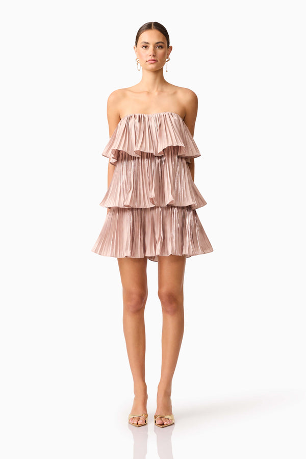 Brunette model wearing Lison Tiered Strapless Mini Dress in Pink front shot