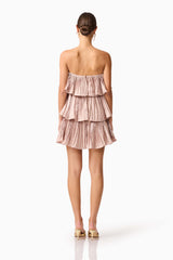 Brunette model wearing Lison Tiered Strapless Mini Dress in Pink back shot