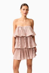 Brunette model wearing Lison Tiered Strapless Mini Dress in Pink close up shot
