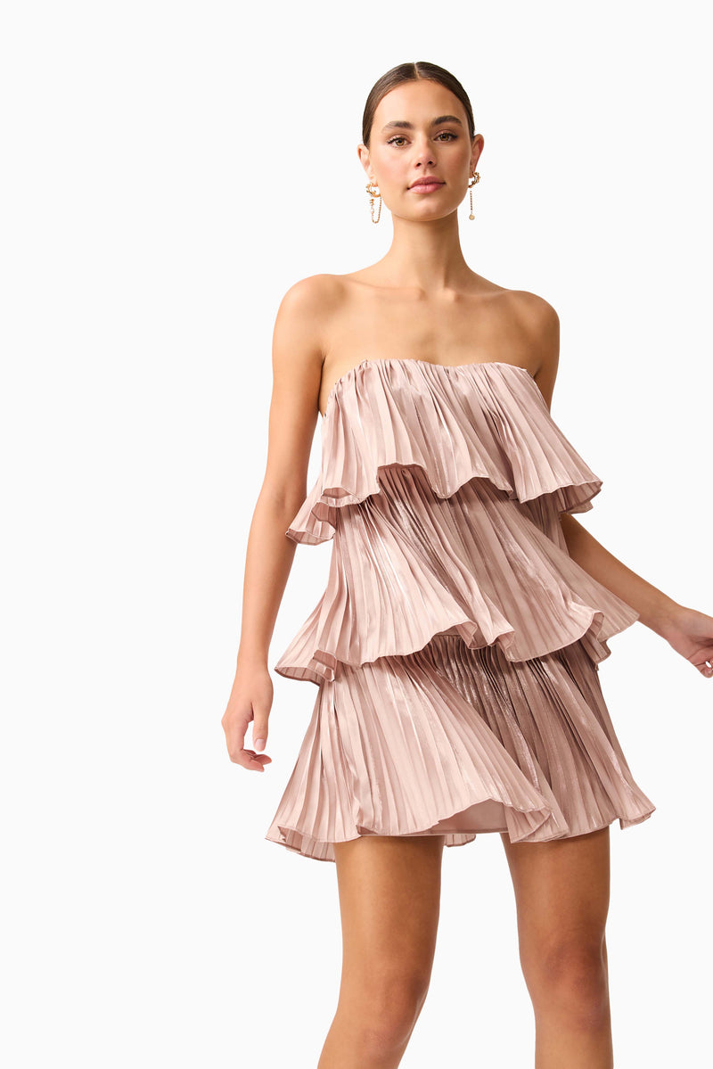 Brunette model wearing Lison Tiered Strapless Mini Dress in Pink close up posed shot