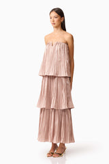 Brunette model wearing Lison Tiered Strapless Gown in Pink side shot