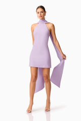 Brunette model wearing Mira Halter Mini Dress in Purple close up shot 