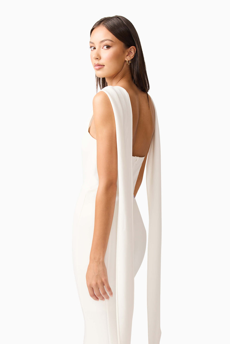 Brunette model wearing the Mira Halter Gown in White detail shot 