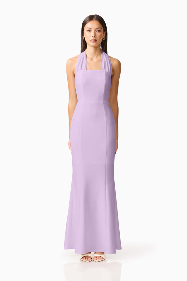 Brunette model wearing the Mira Halter Gown in Purple front shot 