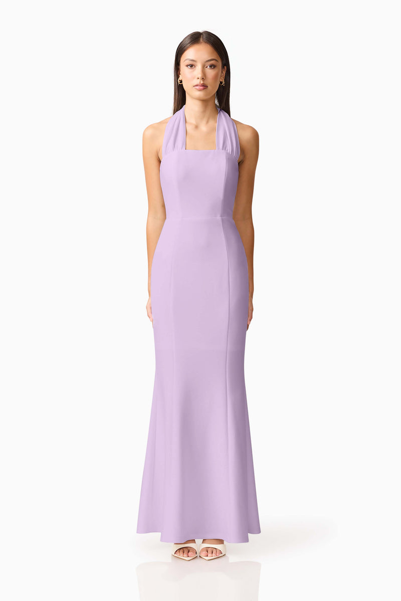 Brunette model wearing the Mira Halter Gown in Purple front shot 