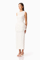 Brunette model wearing Athena Lace Midi Dress in White side shot 