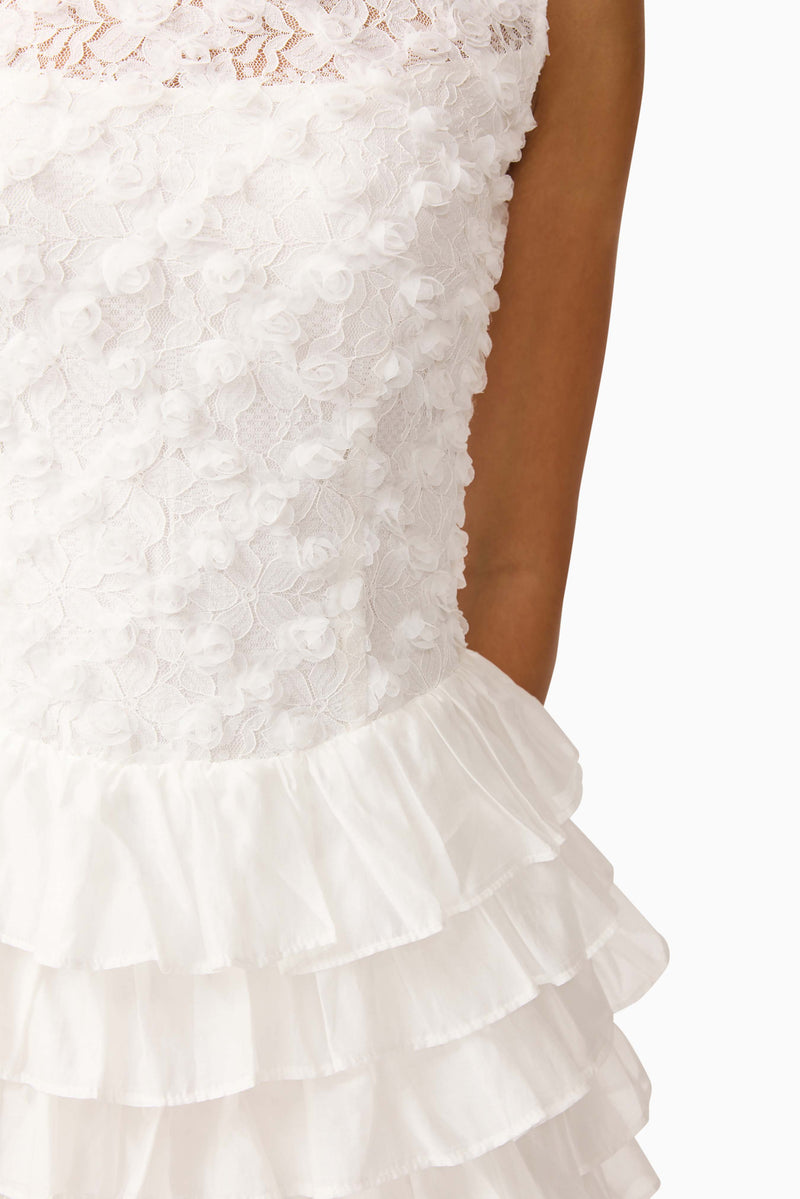 Brunette model wearing Athena Lace Midi Dress in White detail shot 