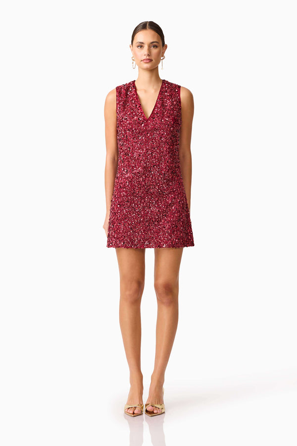 Brunette model wearing Carmen Shift Mini Dress in Red front shot