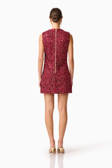 Brunette model wearing Carmen Shift Mini Dress in Red back shot