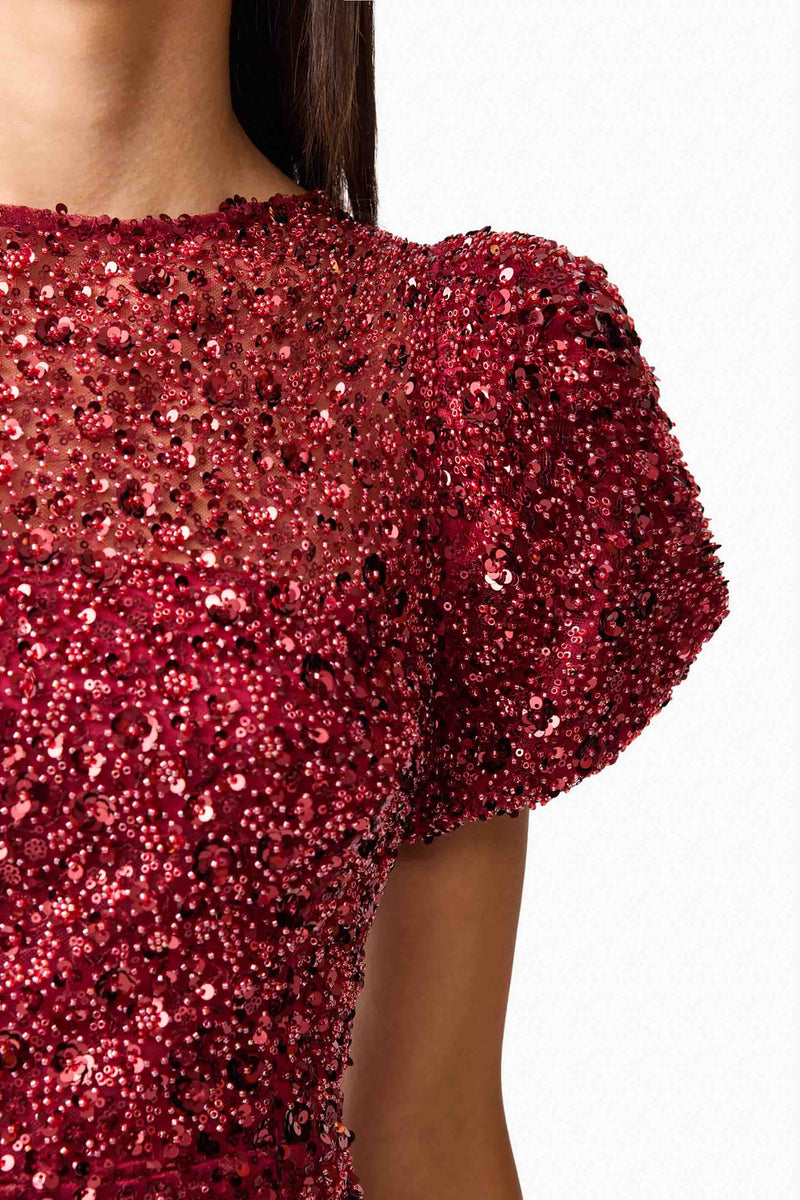 Brunette model wearing Carmen A-Line Mini Dress in Red detail shot