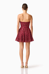Brunette model wearing Carmen A-Line Mini Dress in Red back shot