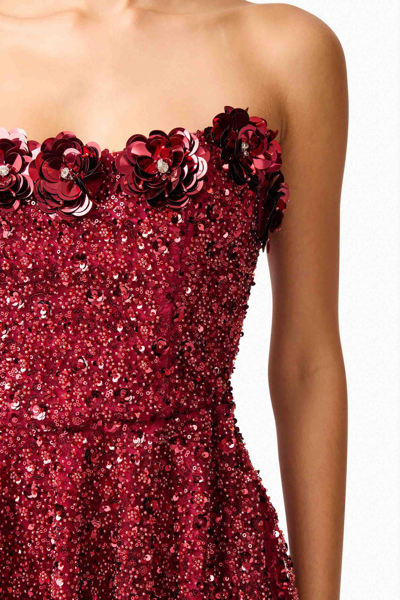 Brunette model wearing Carmen A-Line Mini Dress in Red detail shot