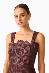Novelle Column Midi Dress in Brown with  a square neckline & lace fabrication close up shot
