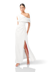 Verdessa Asymmetrical Gown in White with a one off shoulder neckline posed walking shot