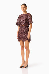 Novelle Top & Mini Skirt Set in Chocolate Brown with round neckline & scalloped hem side shot