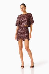 Novelle Top & Mini Skirt Set in Chocolate Brown with round neckline & scalloped hem posed shot