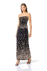 Primelle Embellished Top & Maxi Skirt Set in Black & Gold with strapless neckline & column skirt posed shot