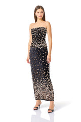 Primelle Embellished Top & Maxi Skirt Set in Black & Gold with strapless neckline & column skirt posed looking away shot
