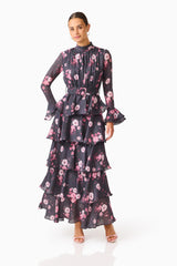 Florisse Tiered Maxi Dress in Black & Pink Floral with long sleeves and a collar neckline posed shot