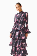 Florisse Tiered Maxi Dress in Black & Pink Floral with long sleeves and a collar neckline close up posed shot