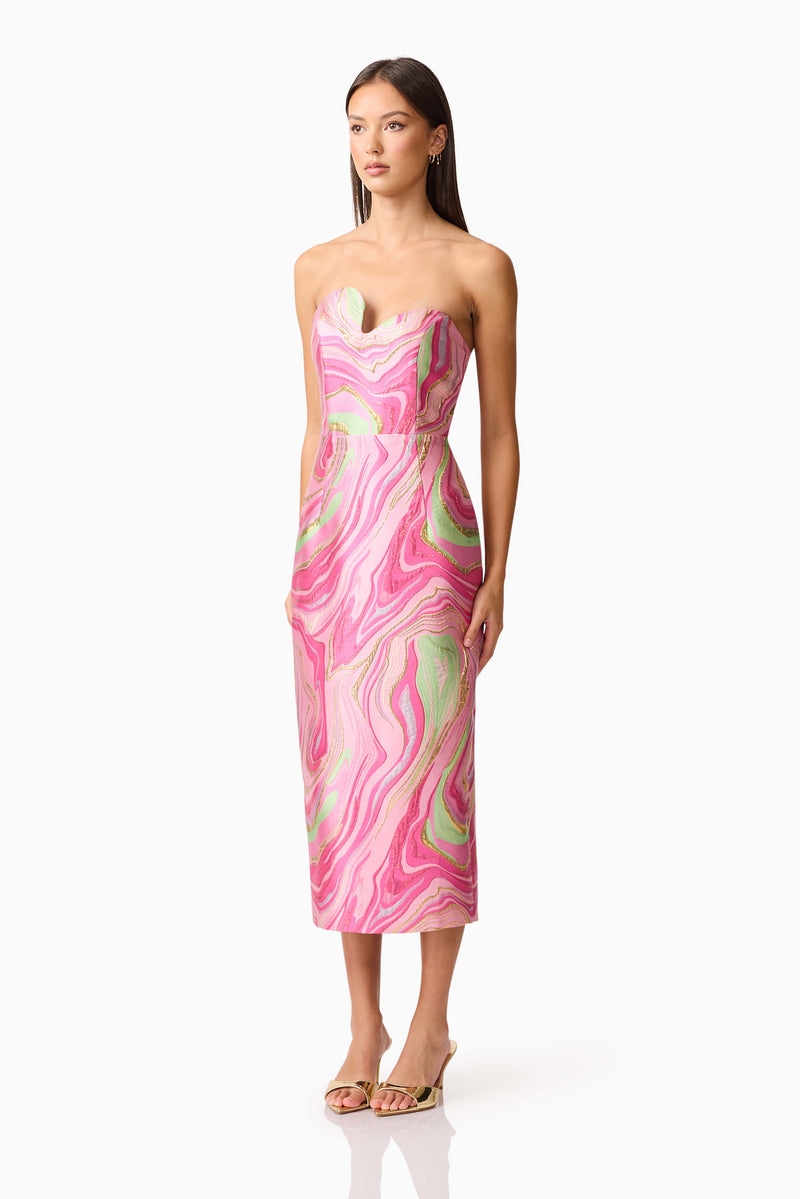 Brunette model wearing the Mirella Strapless Midi Dress in Pink side shot