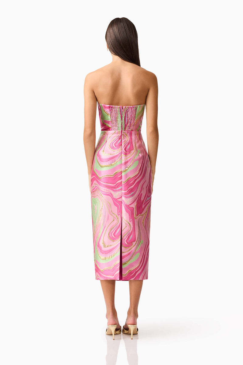 Brunette model wearing the Mirella Strapless Midi Dress in Pink back shot