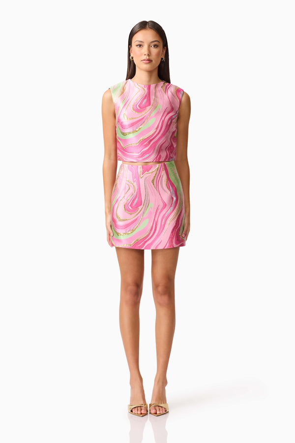 Brunette model wearing Mirella Top & Skirt Set in Pink front shot