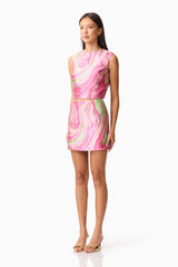 Brunette model wearing Mirella Top & Skirt Set in Pink side shot
