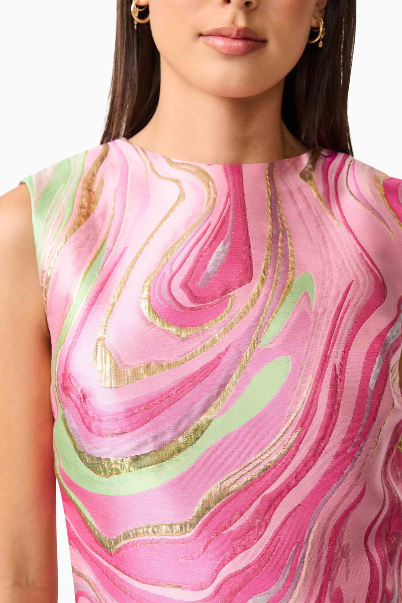 Brunette model wearing Mirella Top & Skirt Set in Pink front detail shot