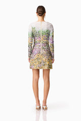 Brunette model wearing the Arden Long Sleeve Mini Dress in Multi Ombre back shot