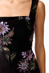 Brunette model wearing the Clio Sequin Gown in Black detail shot