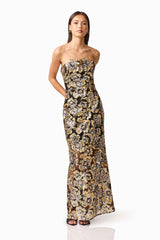 Brunette model wearing the Celeste Strapless Gown in Black and Gold posed shot