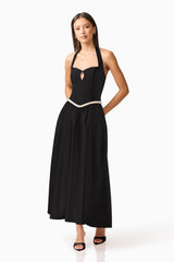 Brunette model wearing Hester Halter Gown in Black front posed shot