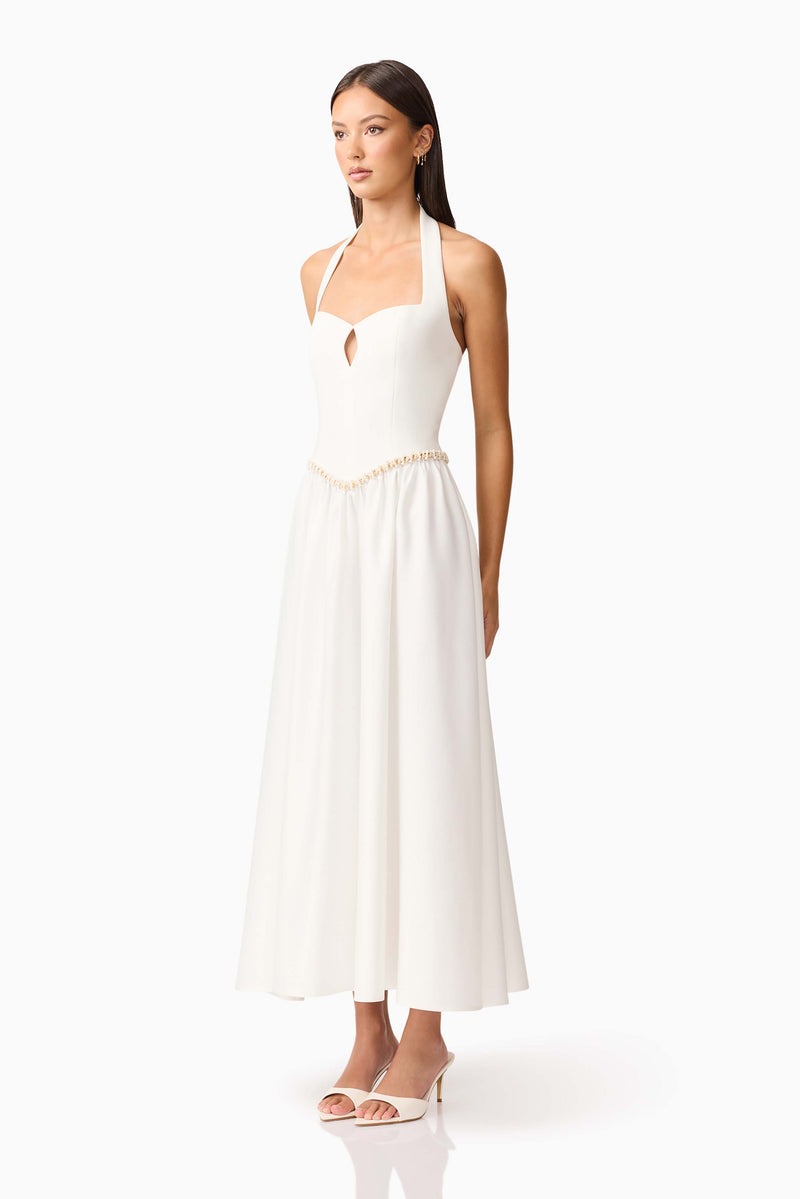 Brunette model wearing the Hester Halter Gown in White side shot