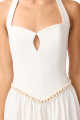 Brunette model wearing the Hester Halter Gown in White detail shot
