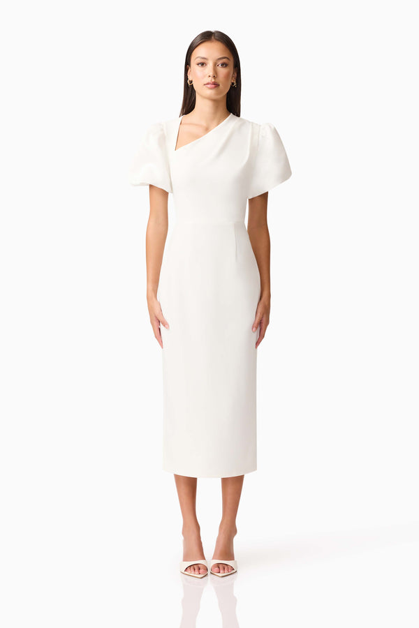 Brunette model wearing the Hester Puff Sleeve Midi Dress in White front shot