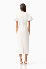 Brunette model wearing the Hester Puff Sleeve Midi Dress in White back shot