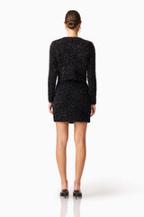 Brunette model wearing the Blythe Knit Set in Black back shot