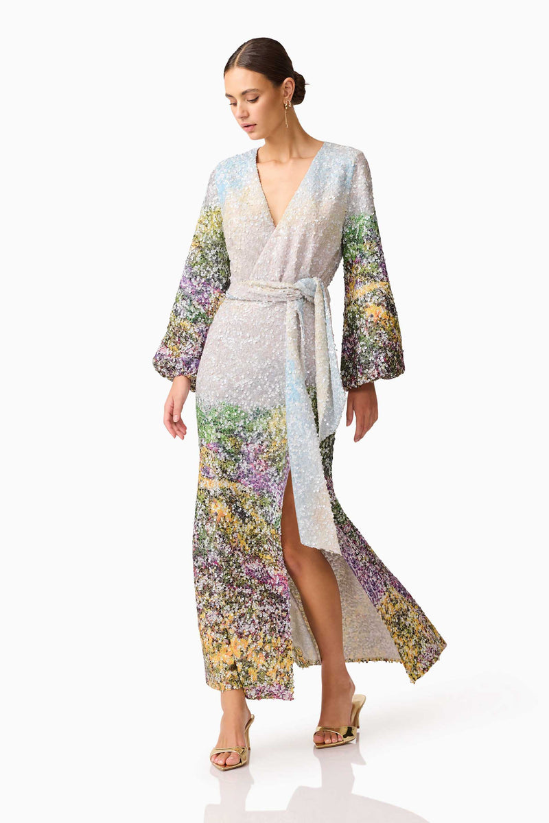 Brunette model wearing the Arden Long Sleeve Gown in Multi Ombre posed shot