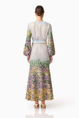 Brunette model wearing the Arden Long Sleeve Gown in Multi Ombre back shot