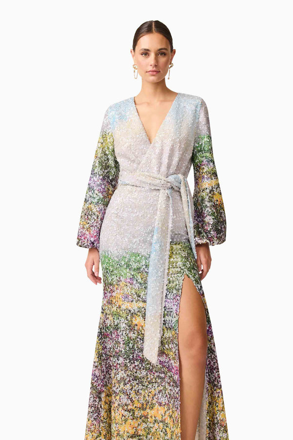 Brunette model wearing the Arden Long Sleeve Gown in Multi Ombre close up shot